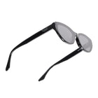 Black cat-eye sunglasses with gray tinted lenses, shown from a side angle on a white background.