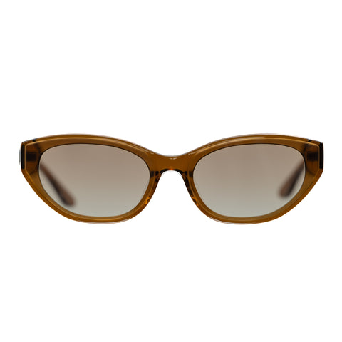 Cat-eye sunglasses with a translucent amber-brown acetate frame and gradient brown lenses, shown against a plain white background.