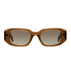 Rectangular sunglasses with a translucent amber-brown acetate frame and gradient brown lenses, shown against a plain white background.